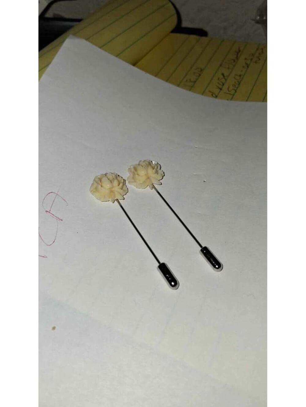 Off white celluloid rise stick pin/hat pin